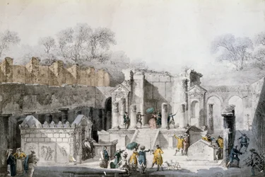 Tourists at the Temple of Isis in the Ruins of Pompeii